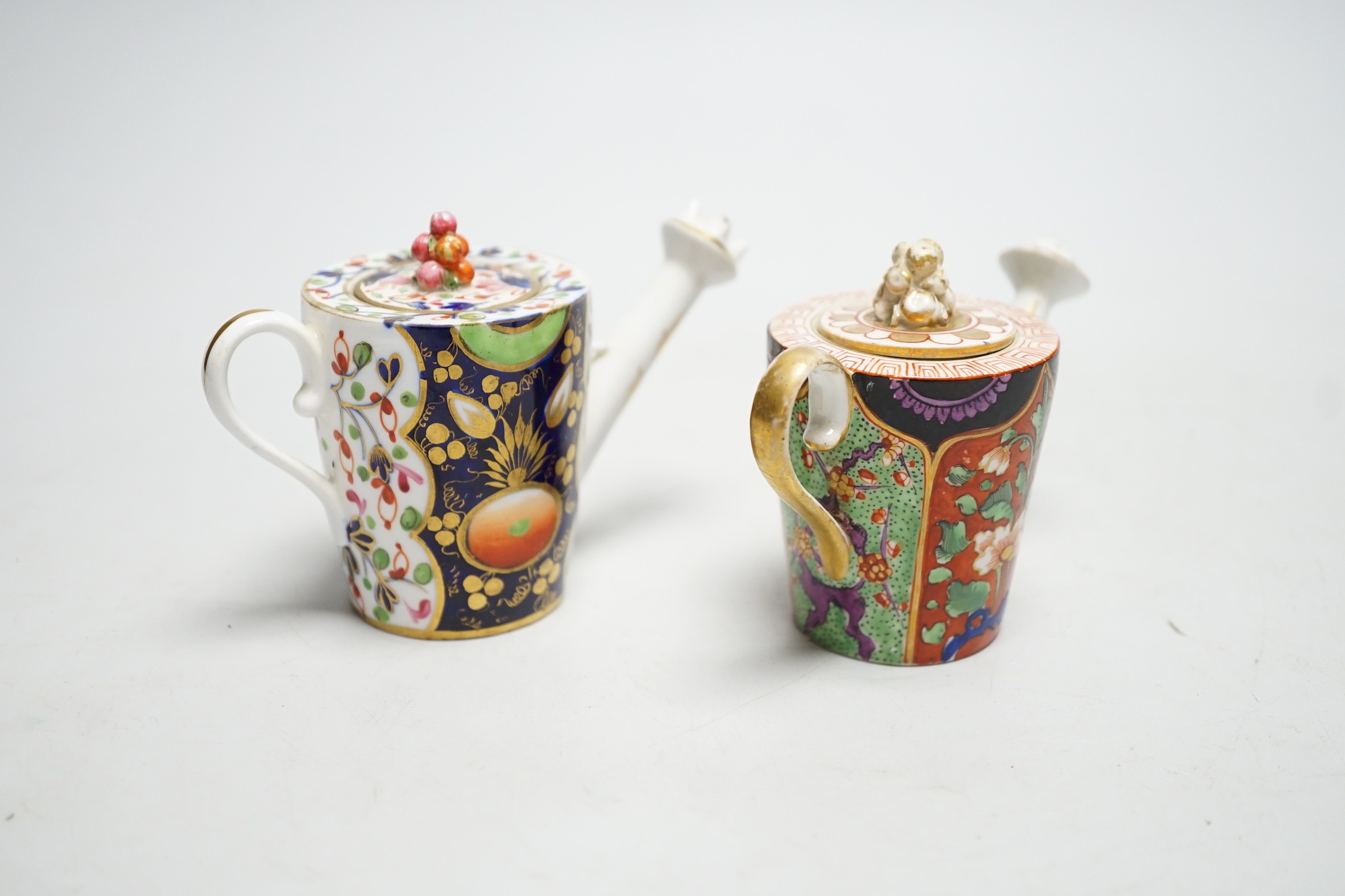 Toy porcelain: Two Derby Japan pattern rosewater sprinklers, c.1815, each modelled in the form of a watering can. 7cm tall
